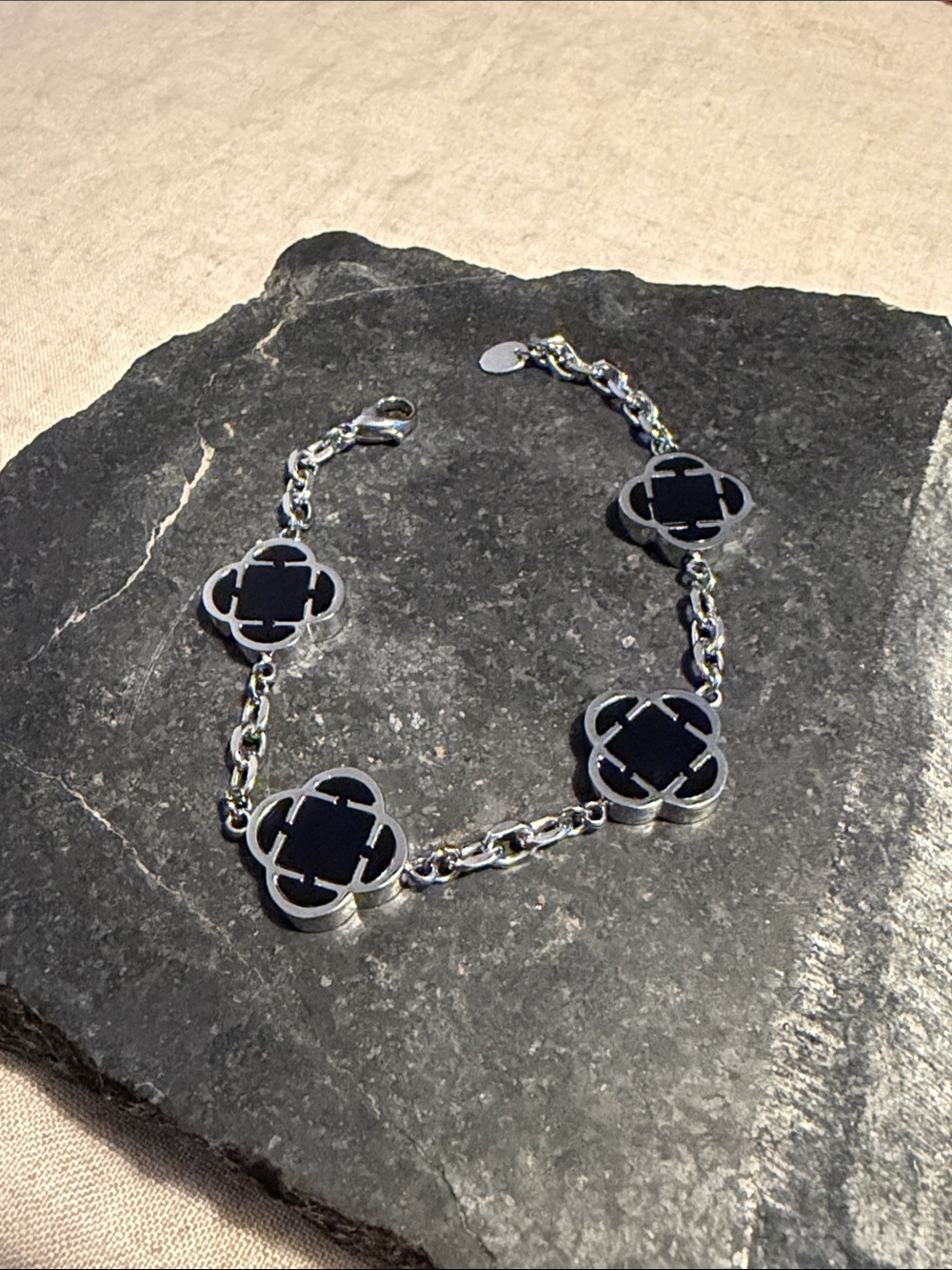 Elegant Black Clover-Linked Silver Bracelet